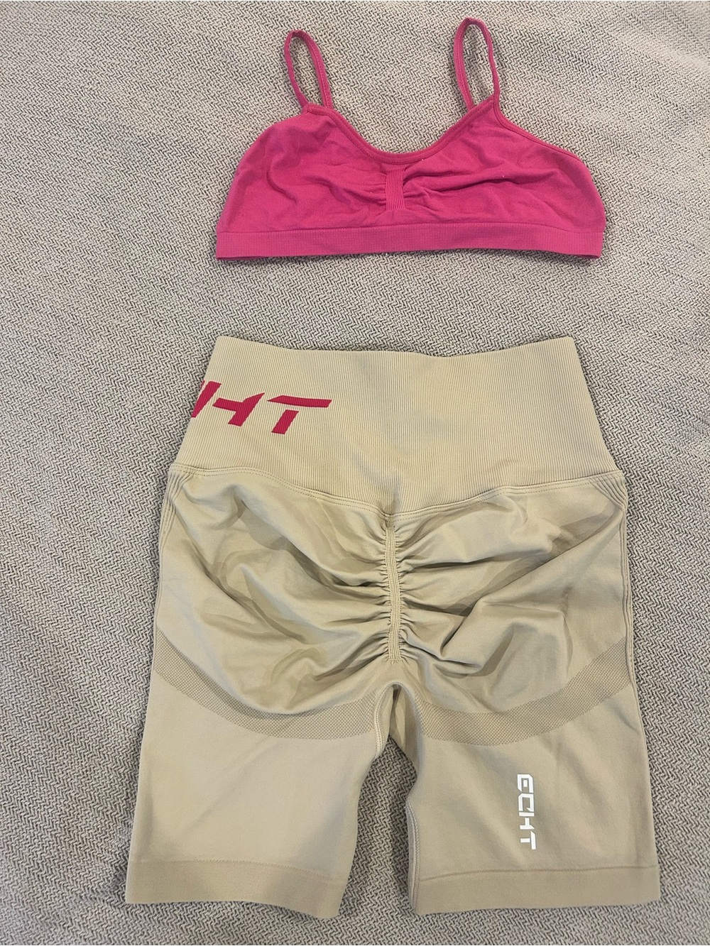 ECHT beige Athletic Shorts with pink ECHT logo, with little pink sports bra Set.
